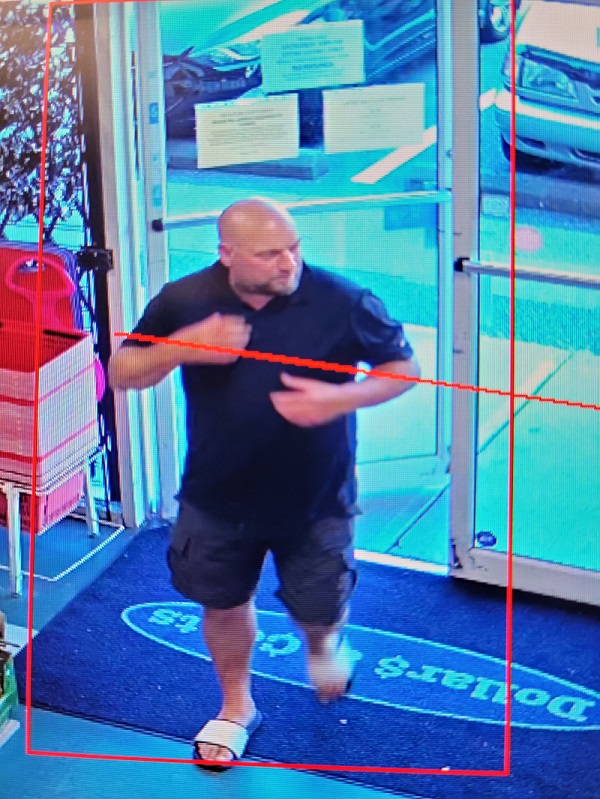 Video surveillance photograph of suspect male
