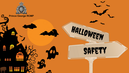Photo of crossed street signs on an orange background that reads <q>Halloween Safety</q>