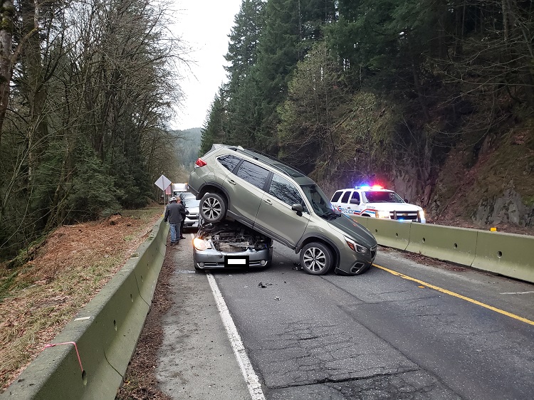 Photo of collision depicting one vehicle on top of a another